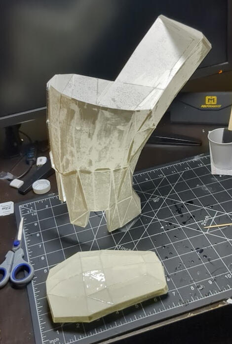 I had originally planned to 3D print the shin guards but ran into time constraints, so I instead made them out of paper and covered them with resin before painting them. Turned out pretty good given the circumstances!