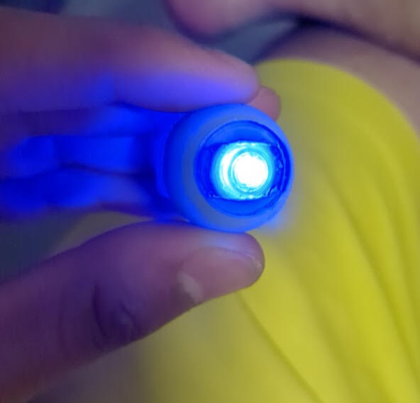 I used two blue kid&#39;s finger lights to make my eyes light up, worked surprisingly well!